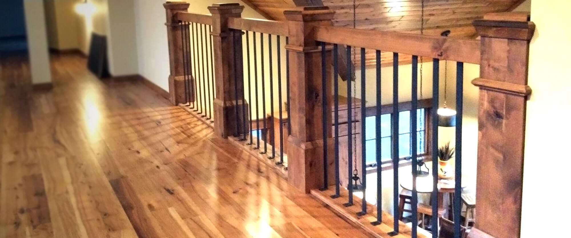 Custom solid wood stair railings; designed, built, and installed by finewood Structures of Browerville, MN